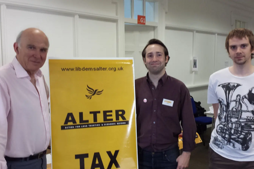 Vince Cable visits ALTER stand at SLF conference, with members Toby Matthews and Daniel Henry.